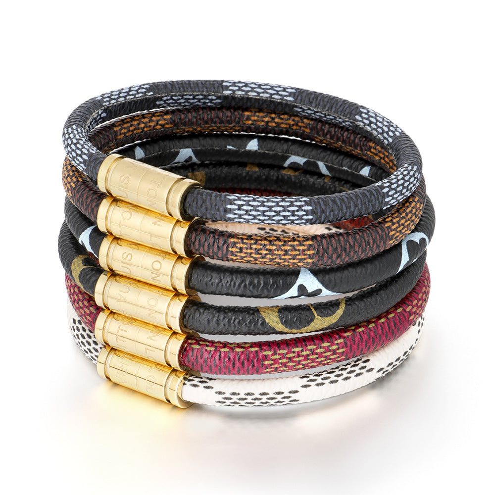 Cross-Border E-Commerce European and American Titanium Steel Lettering Old Pattern Cowhide Rope Bracelet Stainless Steel Magnetic Buckle Male and Female Couple Bracelet